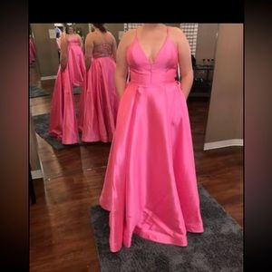 Never worn, still has tag, and in bag. Size 12 but has been altered a bit!